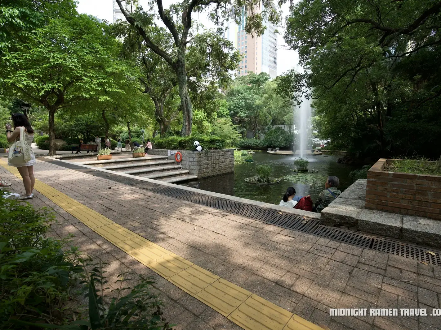 Kowloon Park surrounded by towers in Tsim Sha Tsui