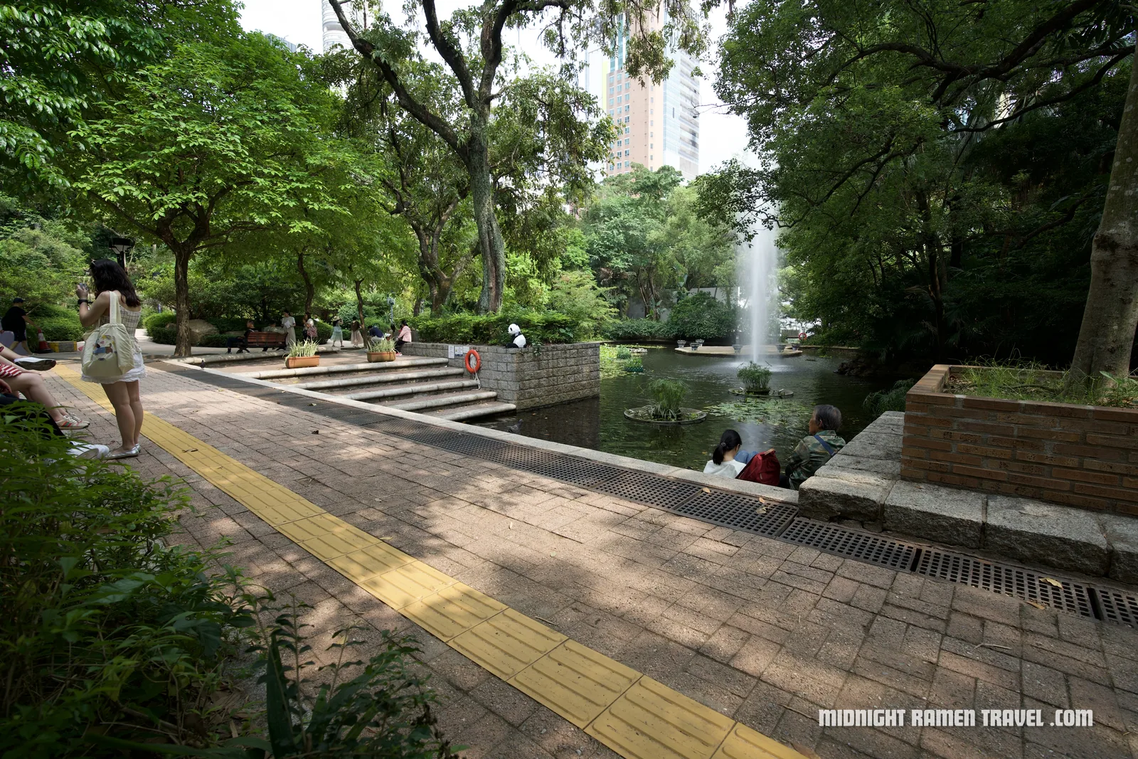 Kowloon Park surrounded by towers in Tsim Sha Tsui