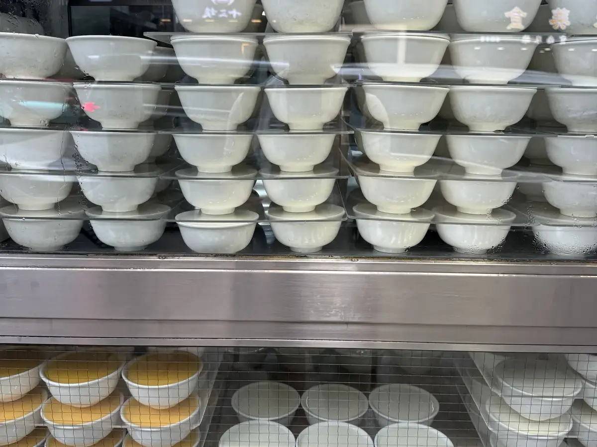 Stacks of bowls inside Australia Dairy Company in Jordan