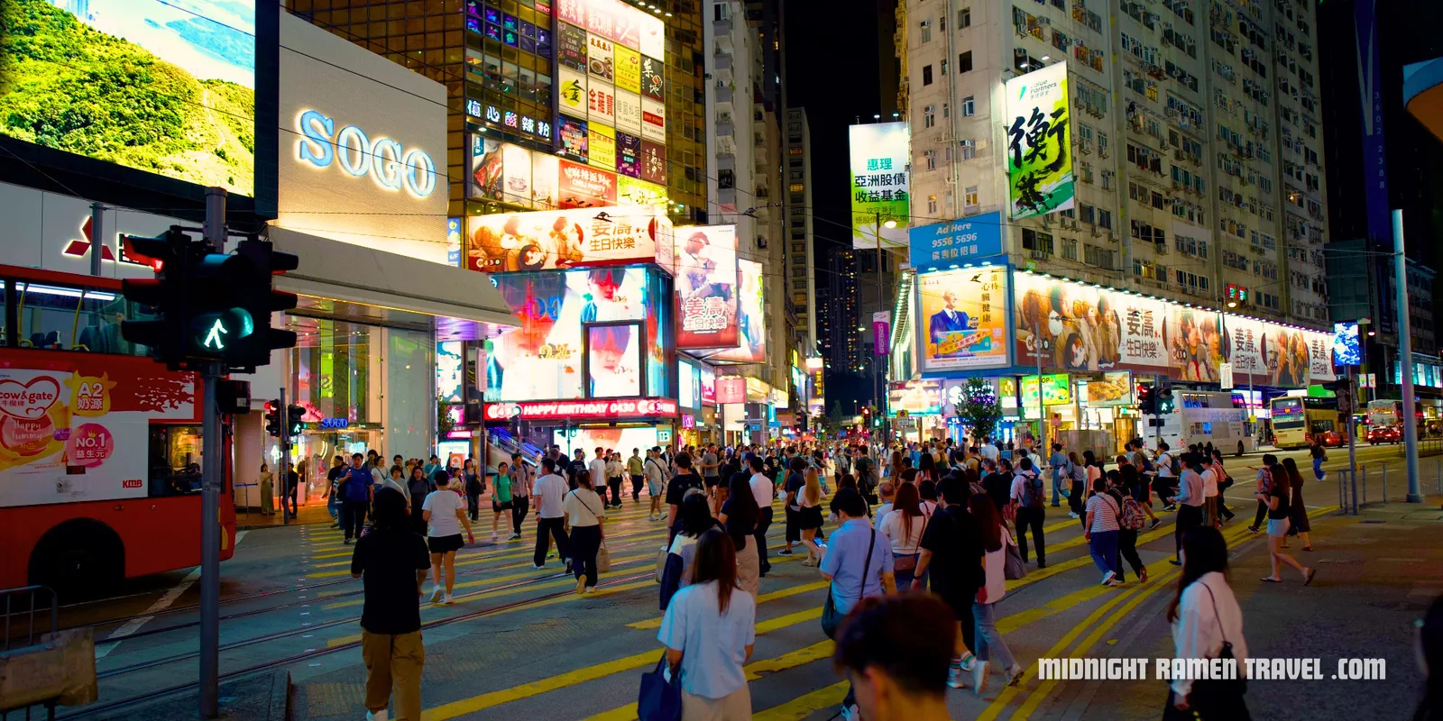 Causeway Bay crossing in Hong Kong at night